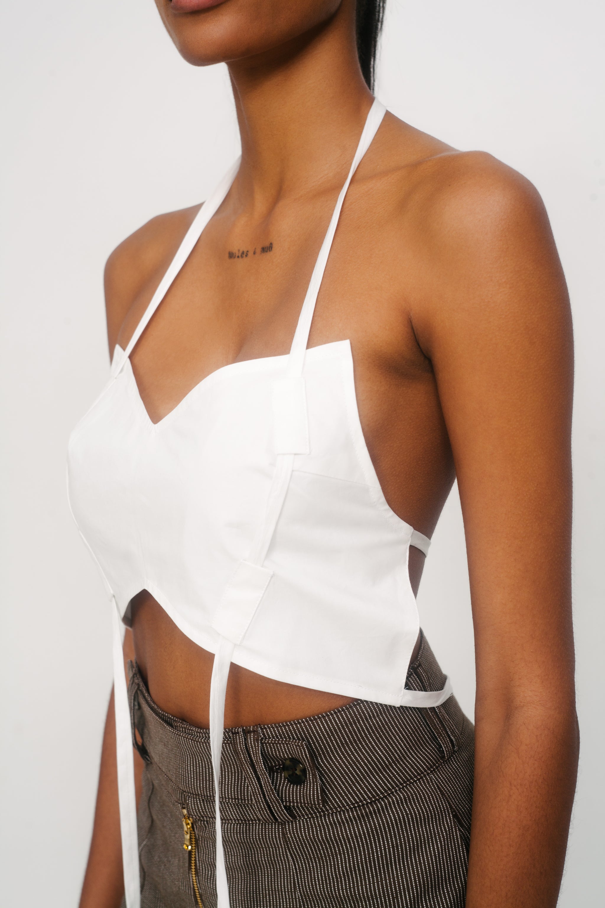 ADJUSTABLE STRING TOP IN WHITE